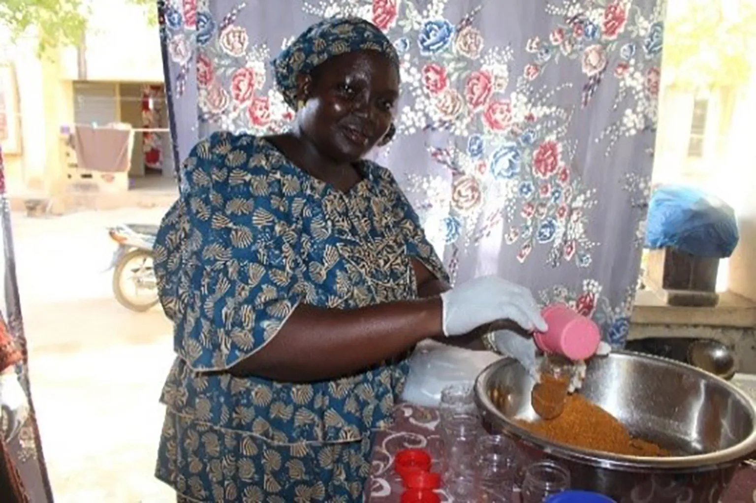 Mariam bottles the chilli powder