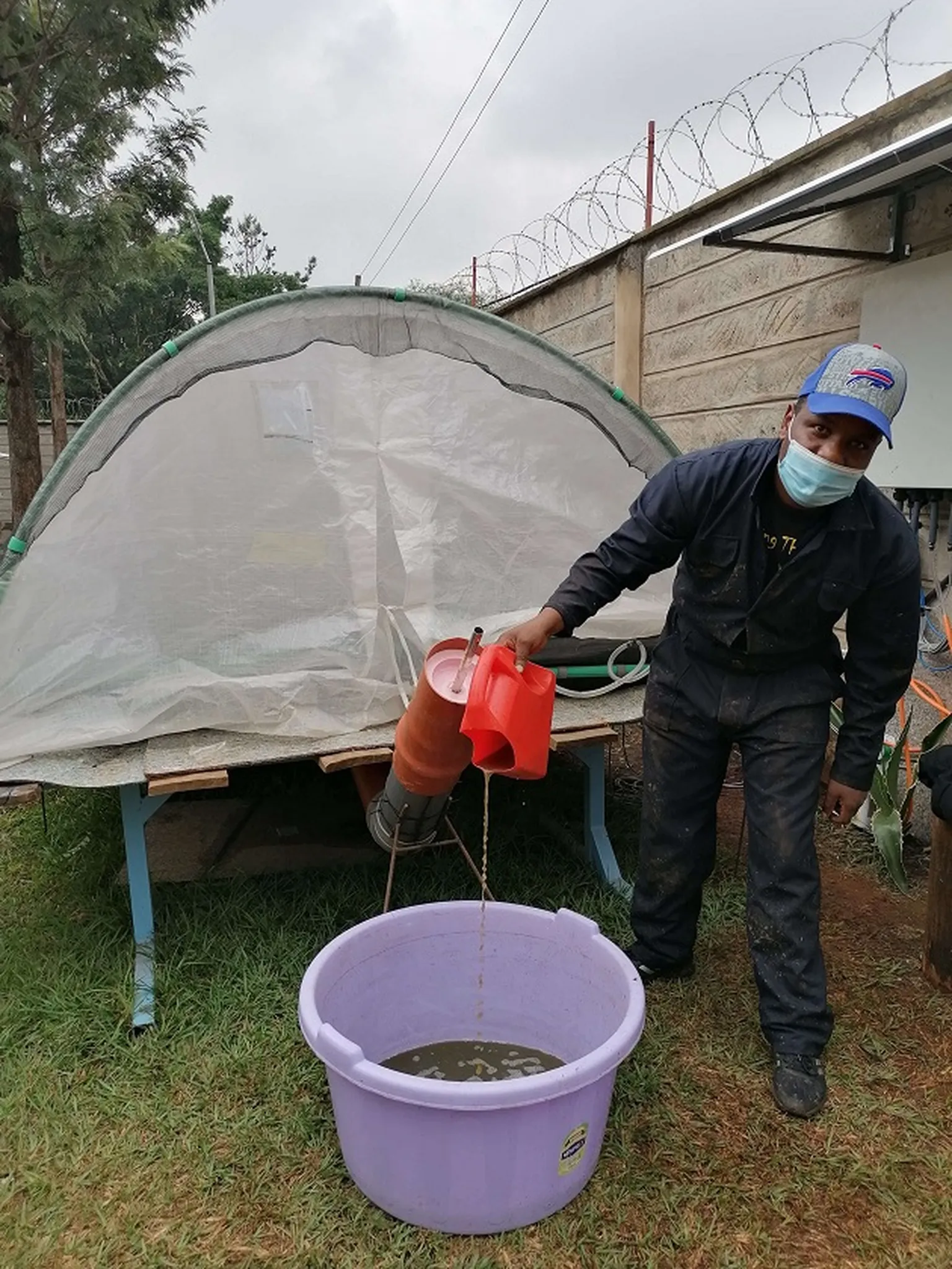 Nelson, the biogas operator hired by SNV managing the system