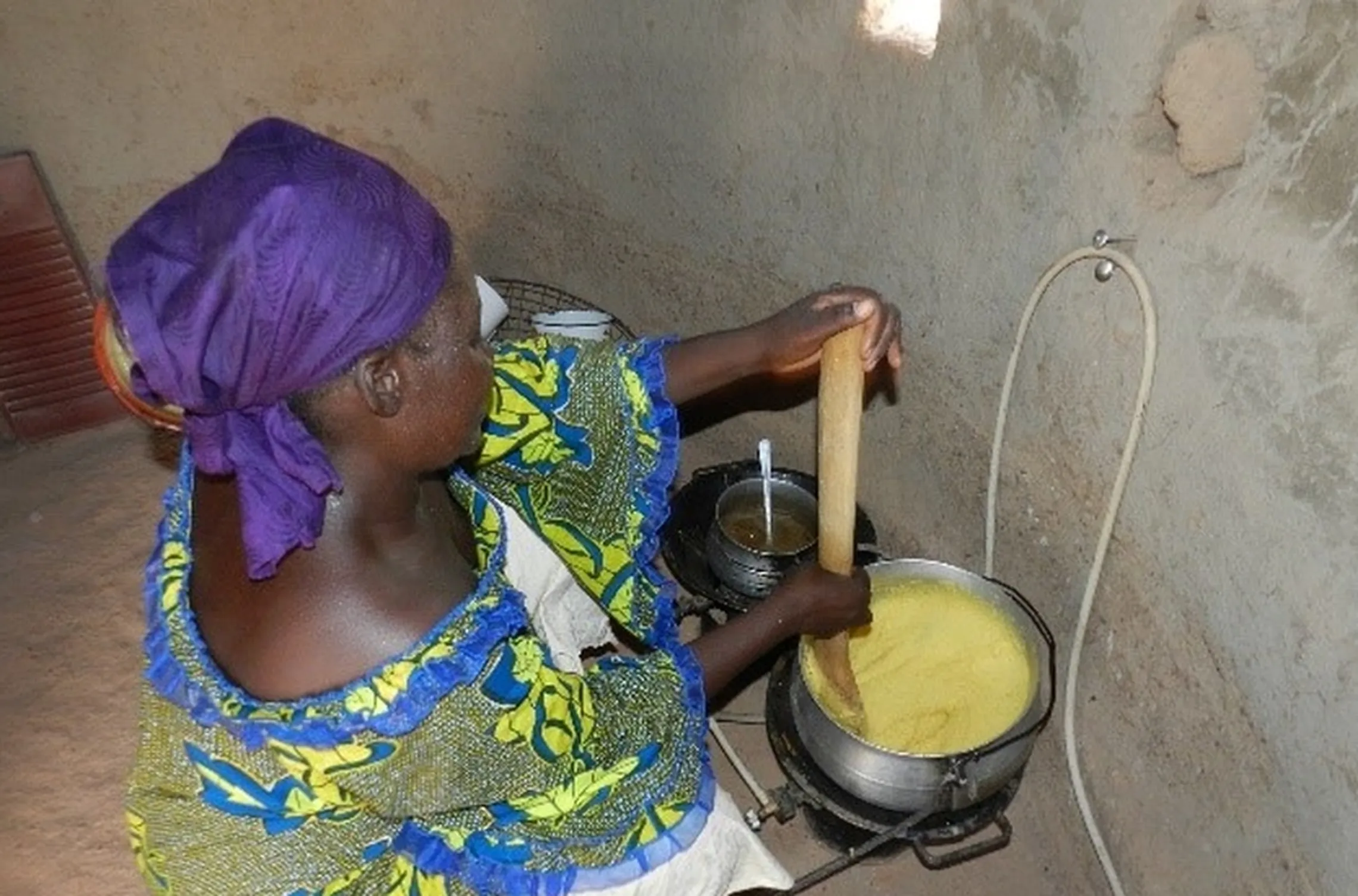 Biogas replaces 12 kg of firewood per household per day with clean cooking fuel.