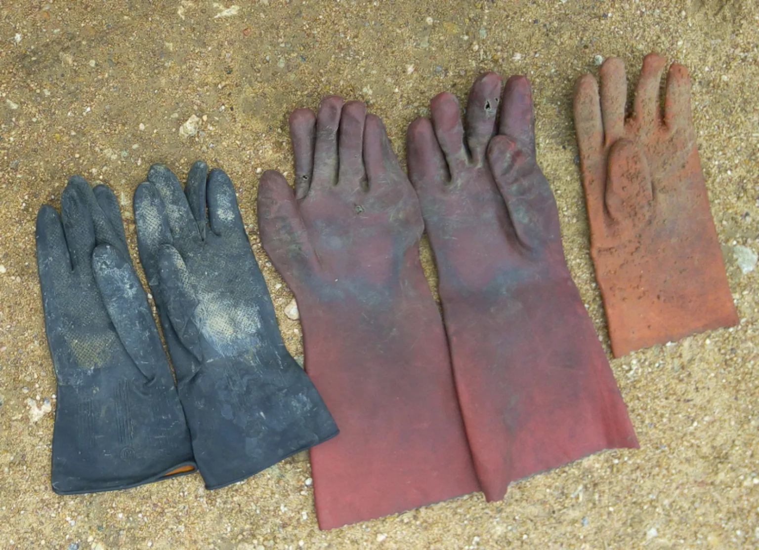 Different workers' gloves in focus*