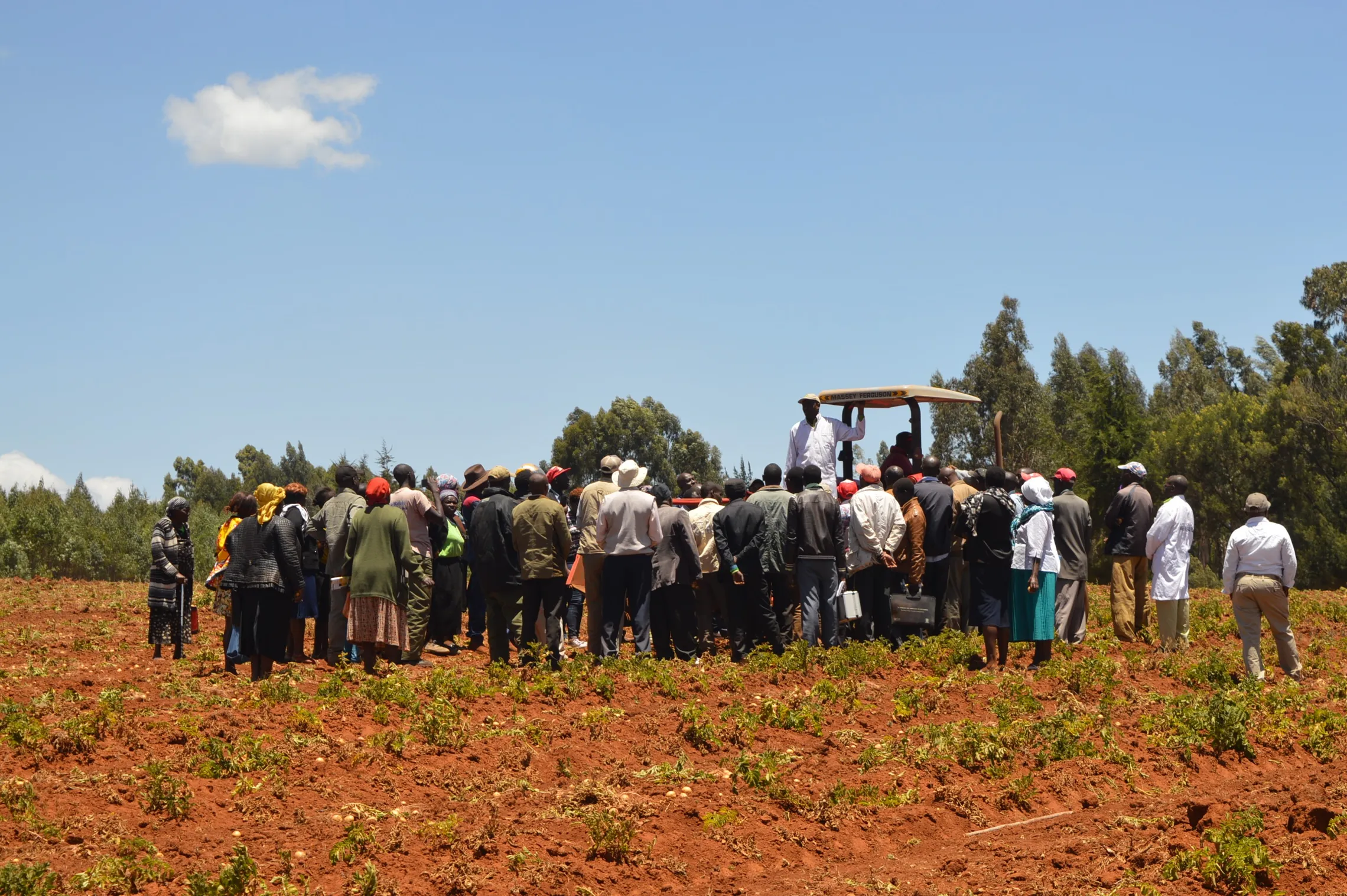 Farmers from Nyandarua listening to an AMS representative