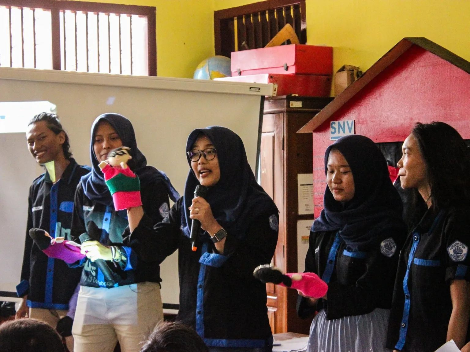 Youth-led personal hygiene training for young girl students by SNV partners, YSC in Indonesia