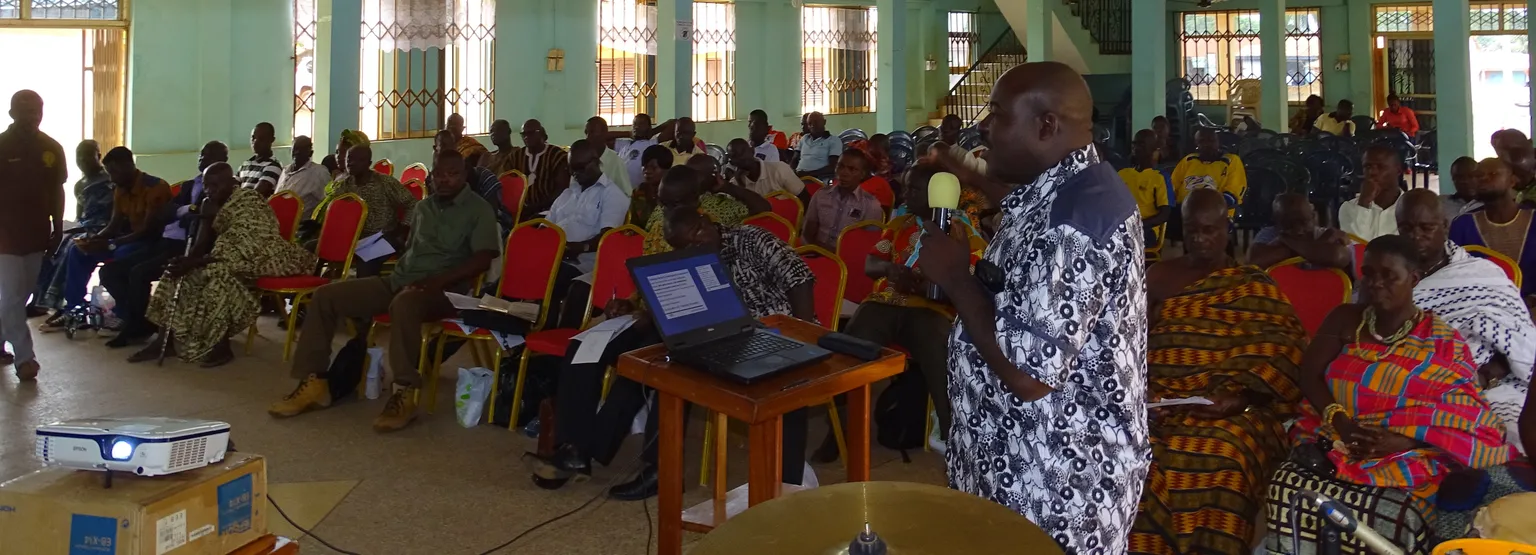 Traditional leaders and migrant farmers meeting in Essam