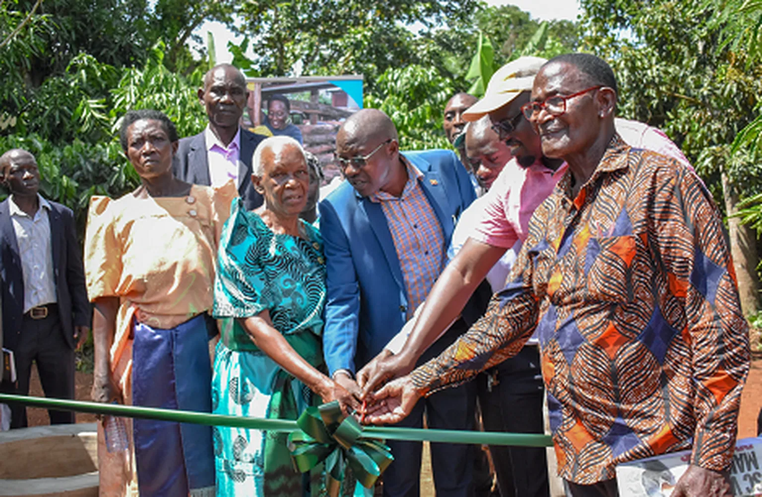 Image of a group of people cutting a ribbon