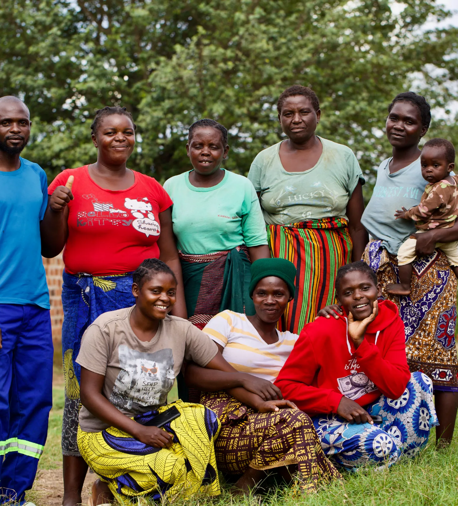 A group of young people pose to take a photo in Zambia