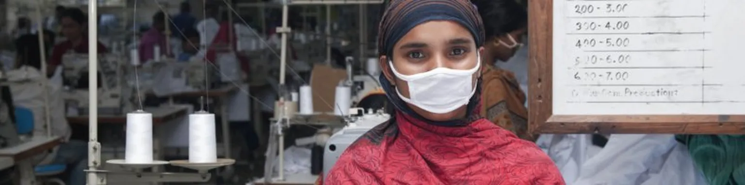 Woman with mask in factory