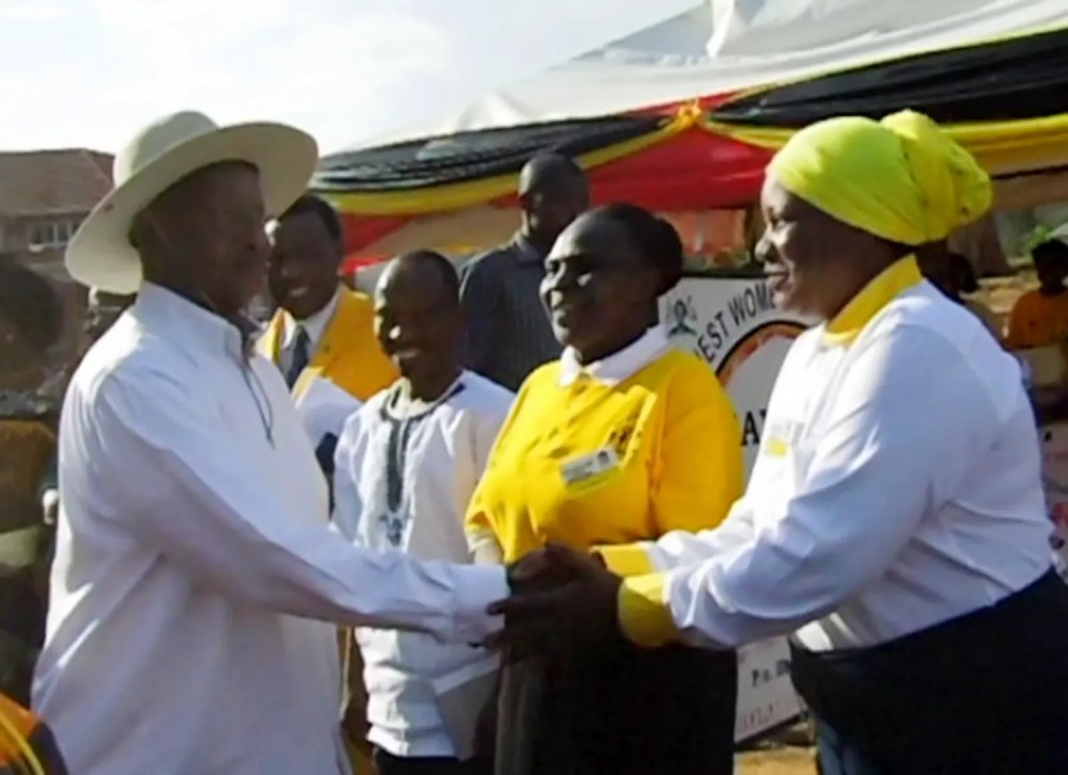 H.E. President Museveni congratulates Zainab after launching their cooperative