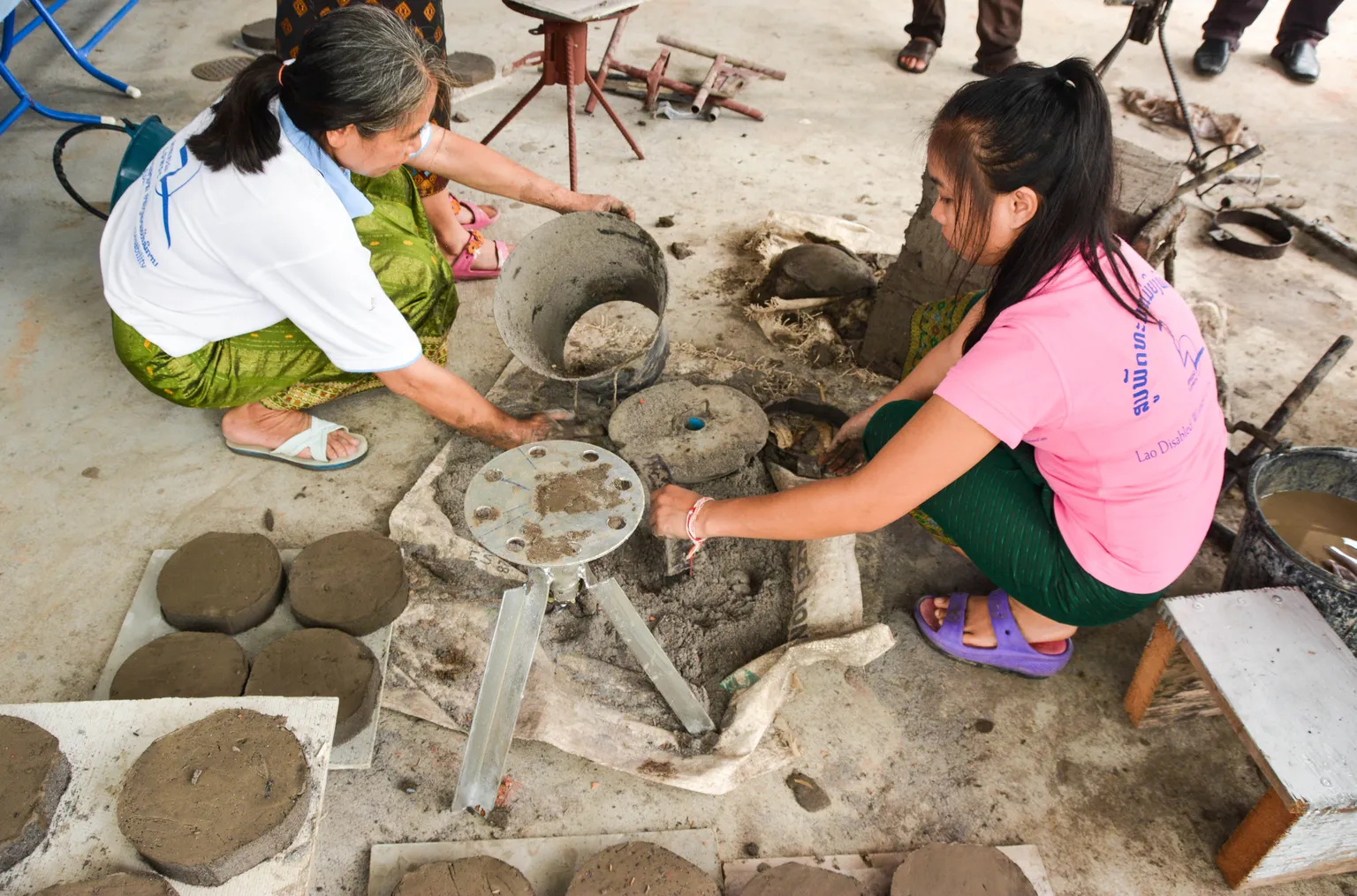 Improved cookstoves break ground at the Lao Disabled Women's Development Centre