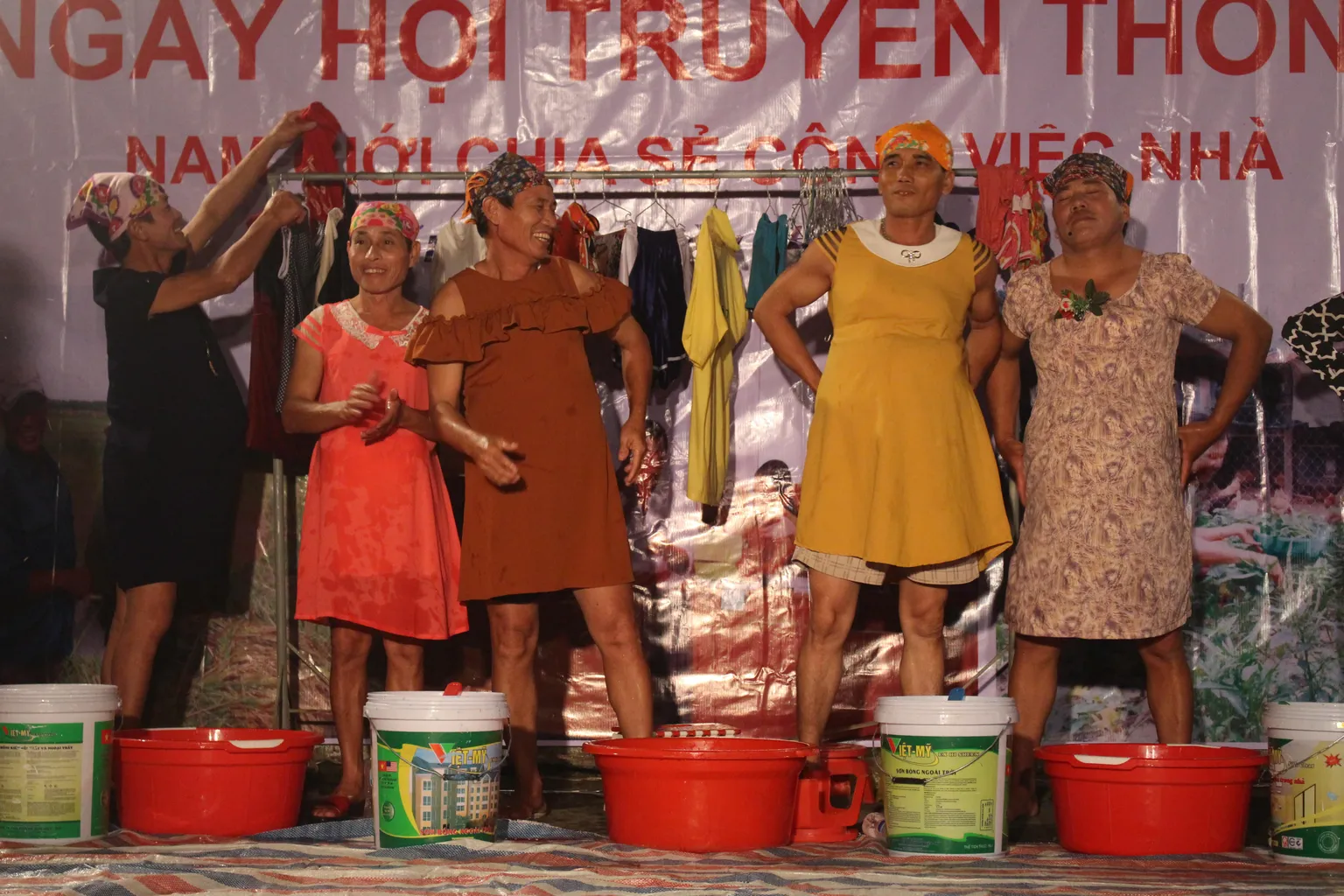 Men experience to be pregnant and wash clothes during commune festival, Vietnam