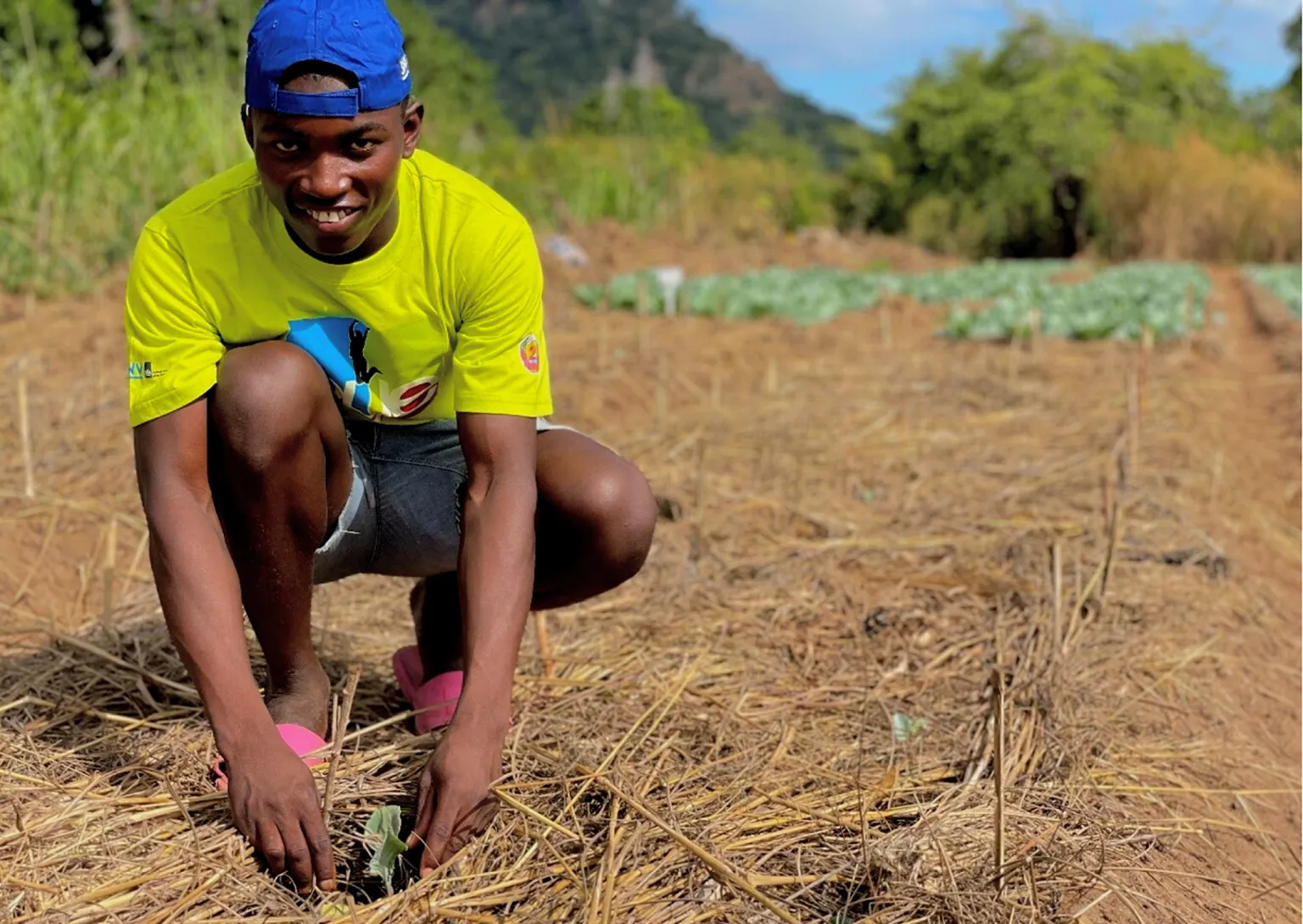 A photo of Augusto Agostinho in an agricultural field