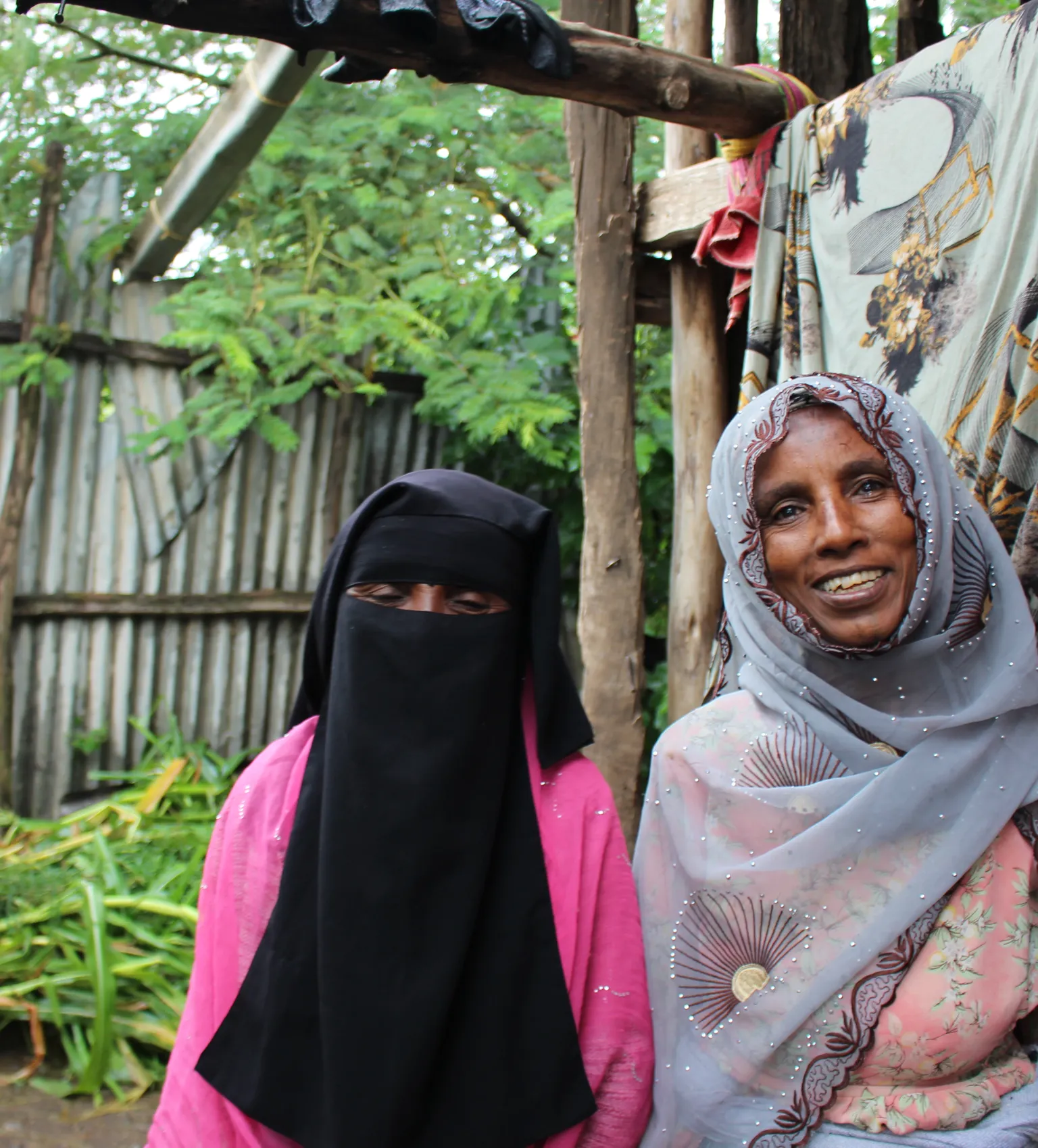 Zeritu and Zeyneba from the Amhara region are all smiles as they no longer need to draw water from unsafe sources, thanks to an SNV WASH project supported by USAID.