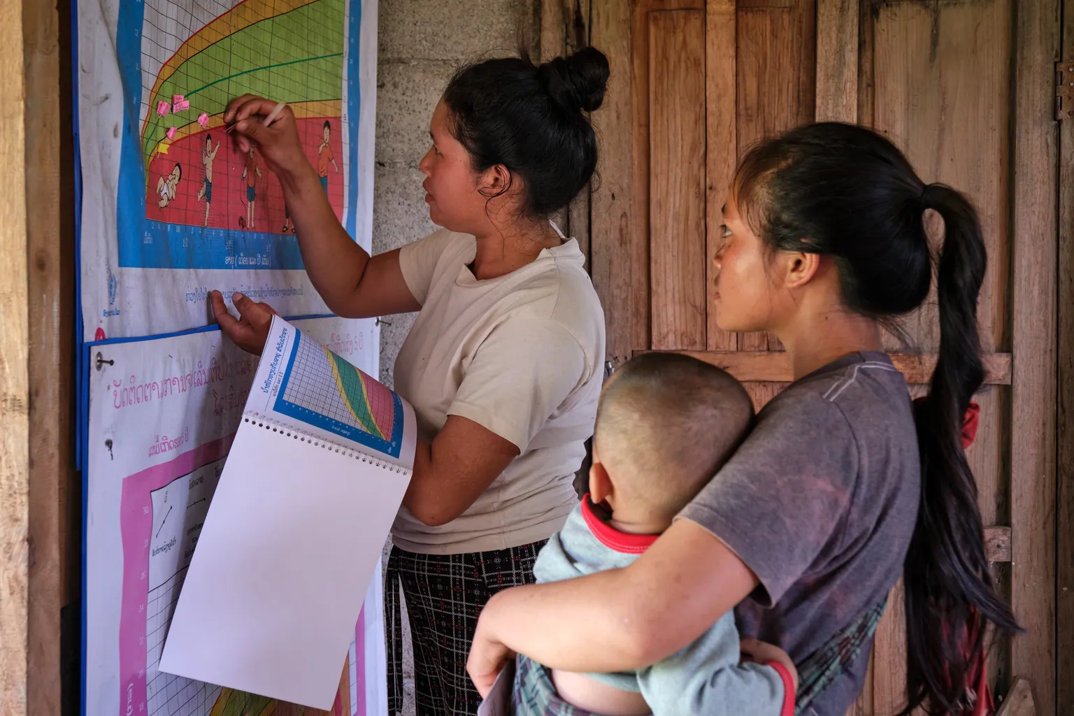 Mother and child visit the Healthcare Centre