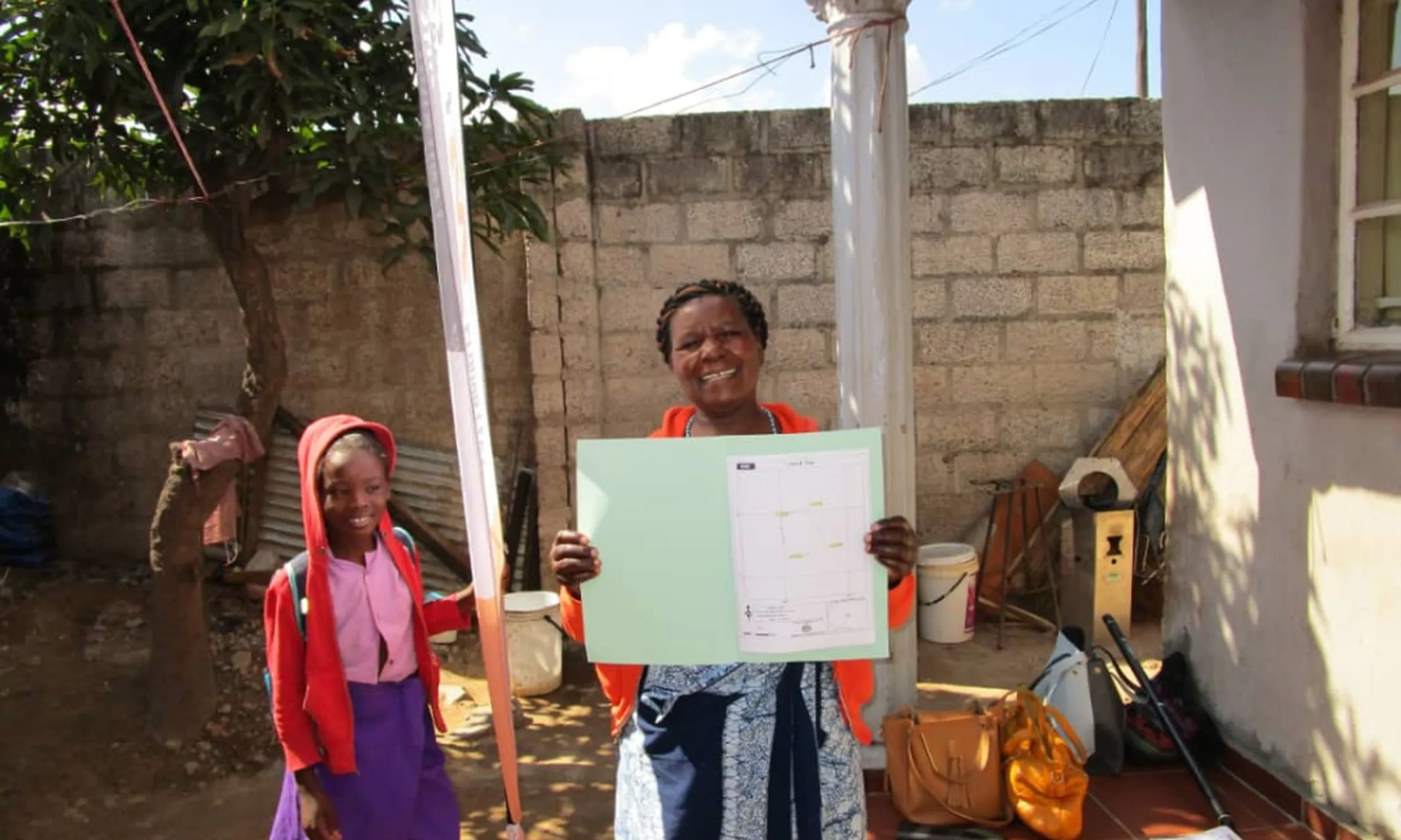 Medeems client showing her parcel certificate