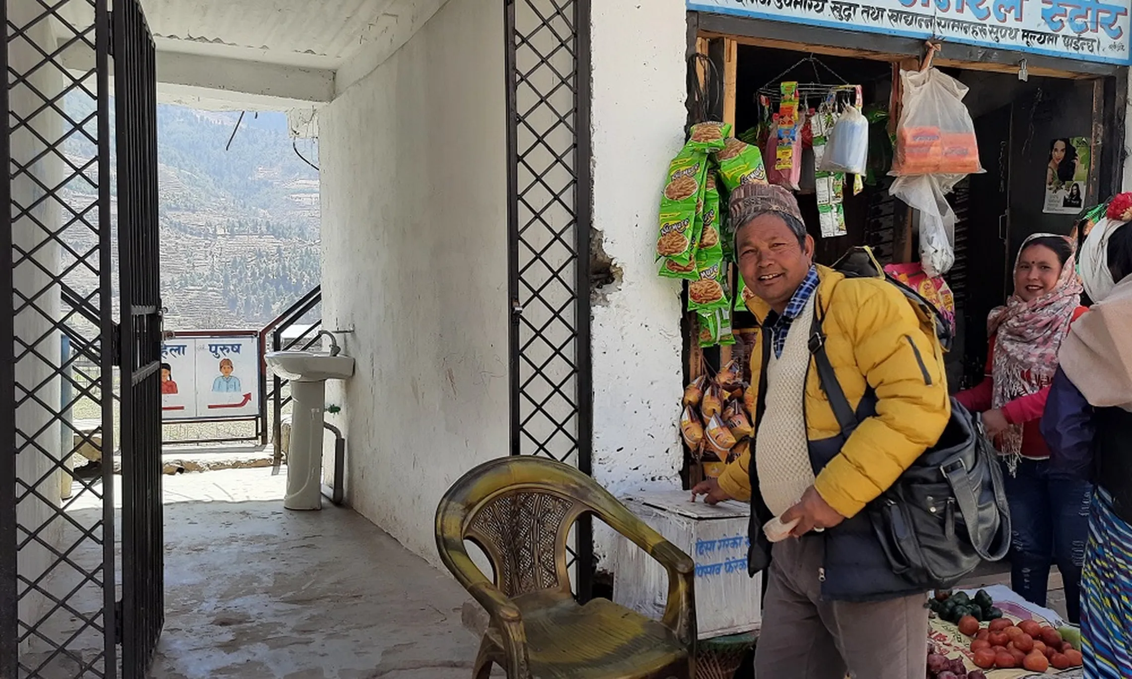 Market visitor paying toilet user fee