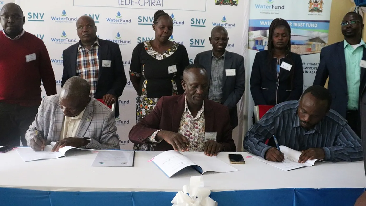 Contract signing in rural Kenya 1