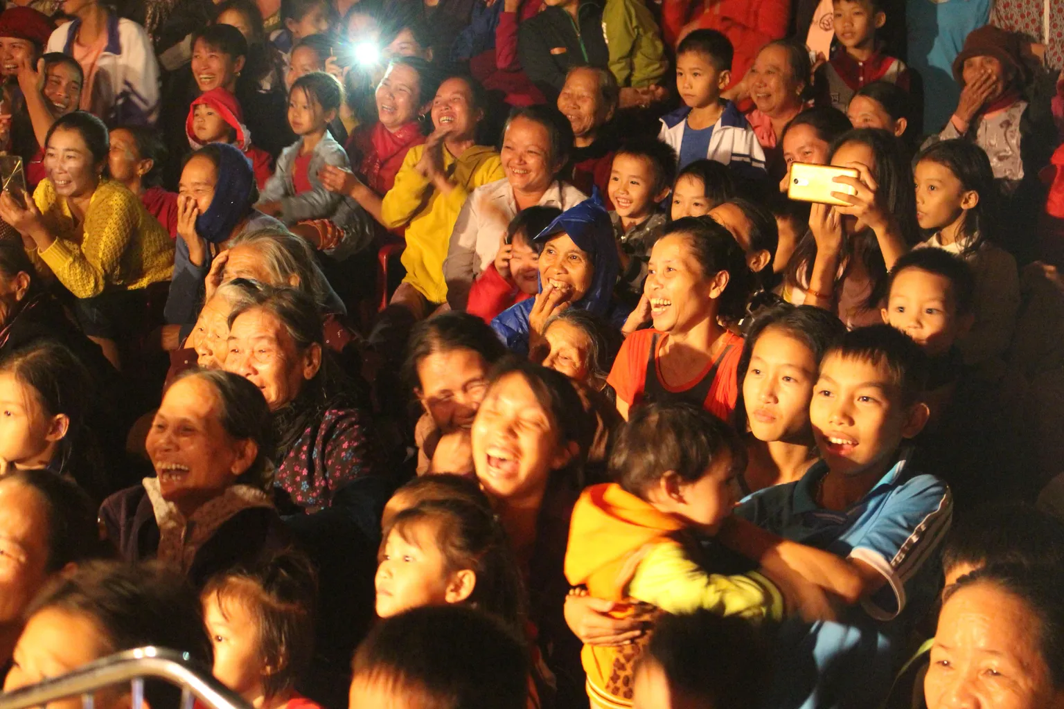 Laughter and joy in the audience during commune festival in Quang Binh