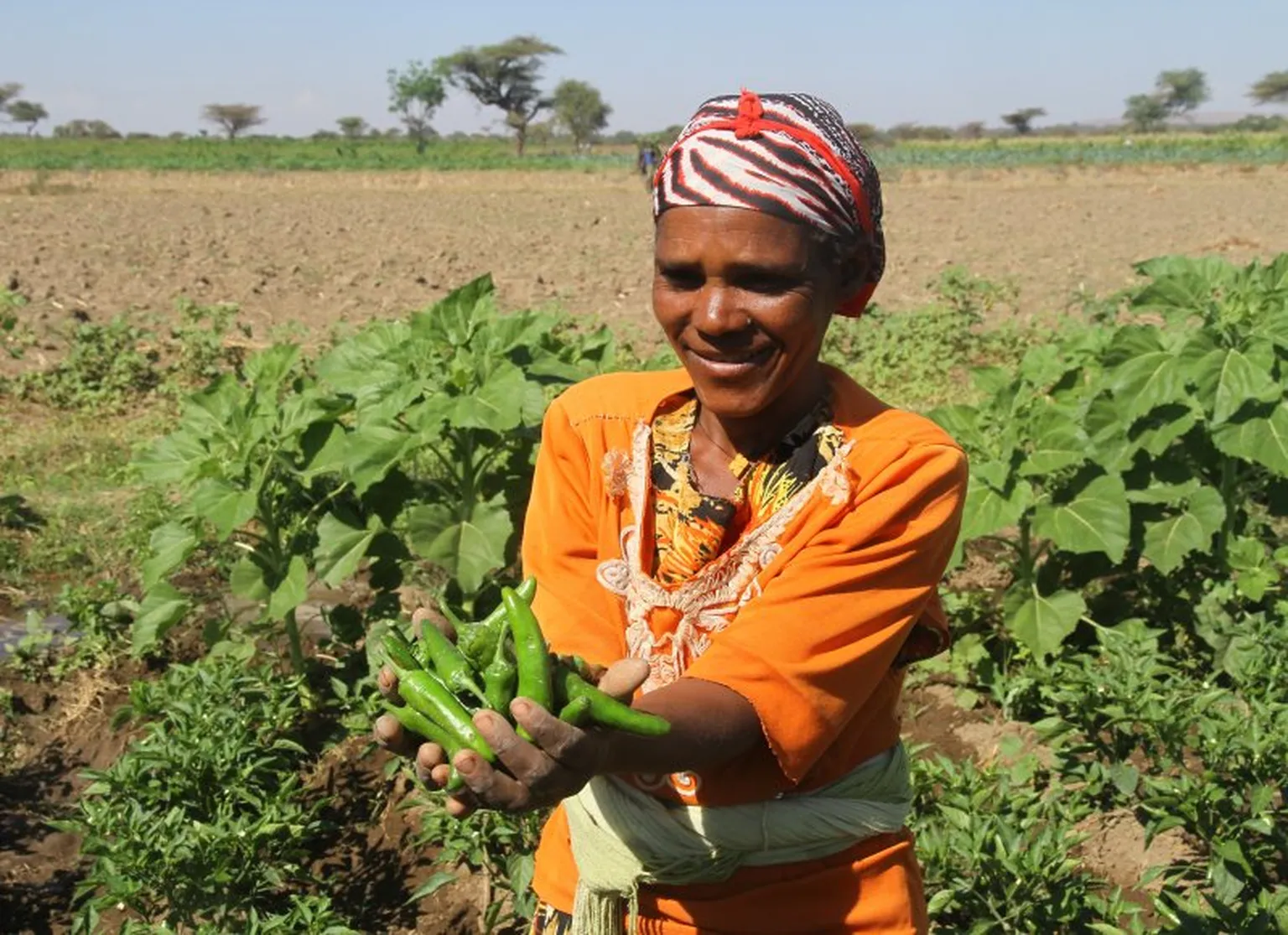 Woman showing crops