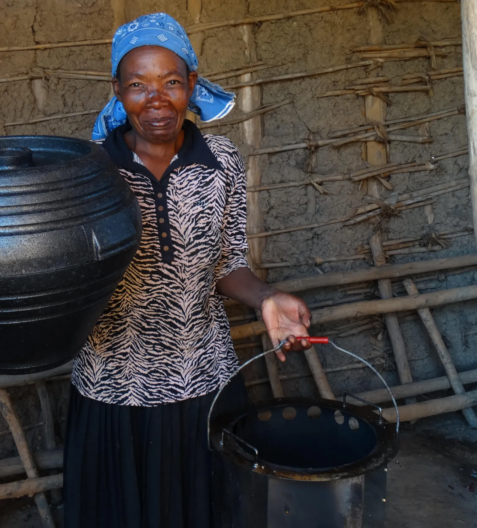 Women driving adoption of improved cookstoves in Rwandan villages