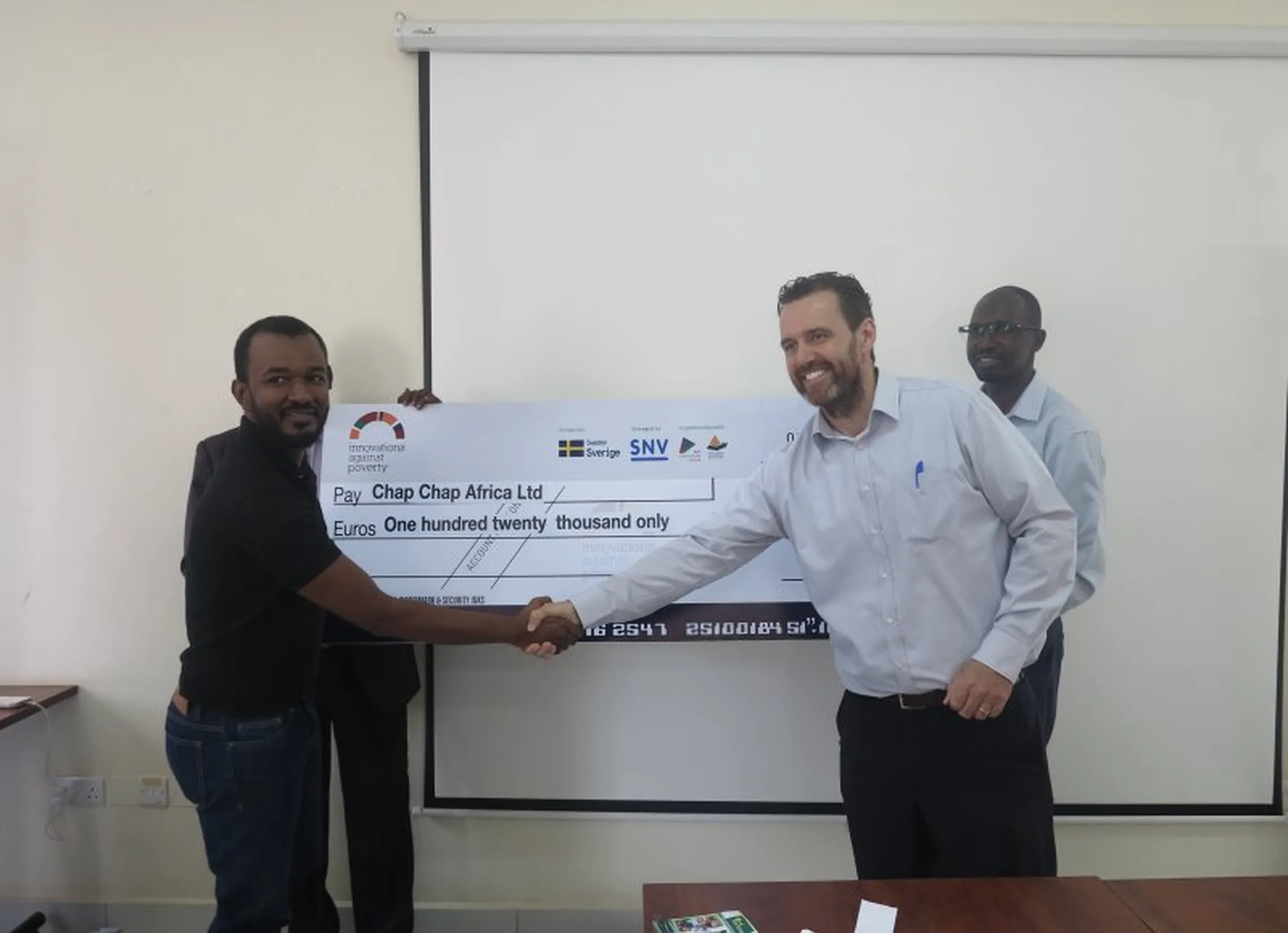 ChapChap Managing Director -Left receiving the IAP grant