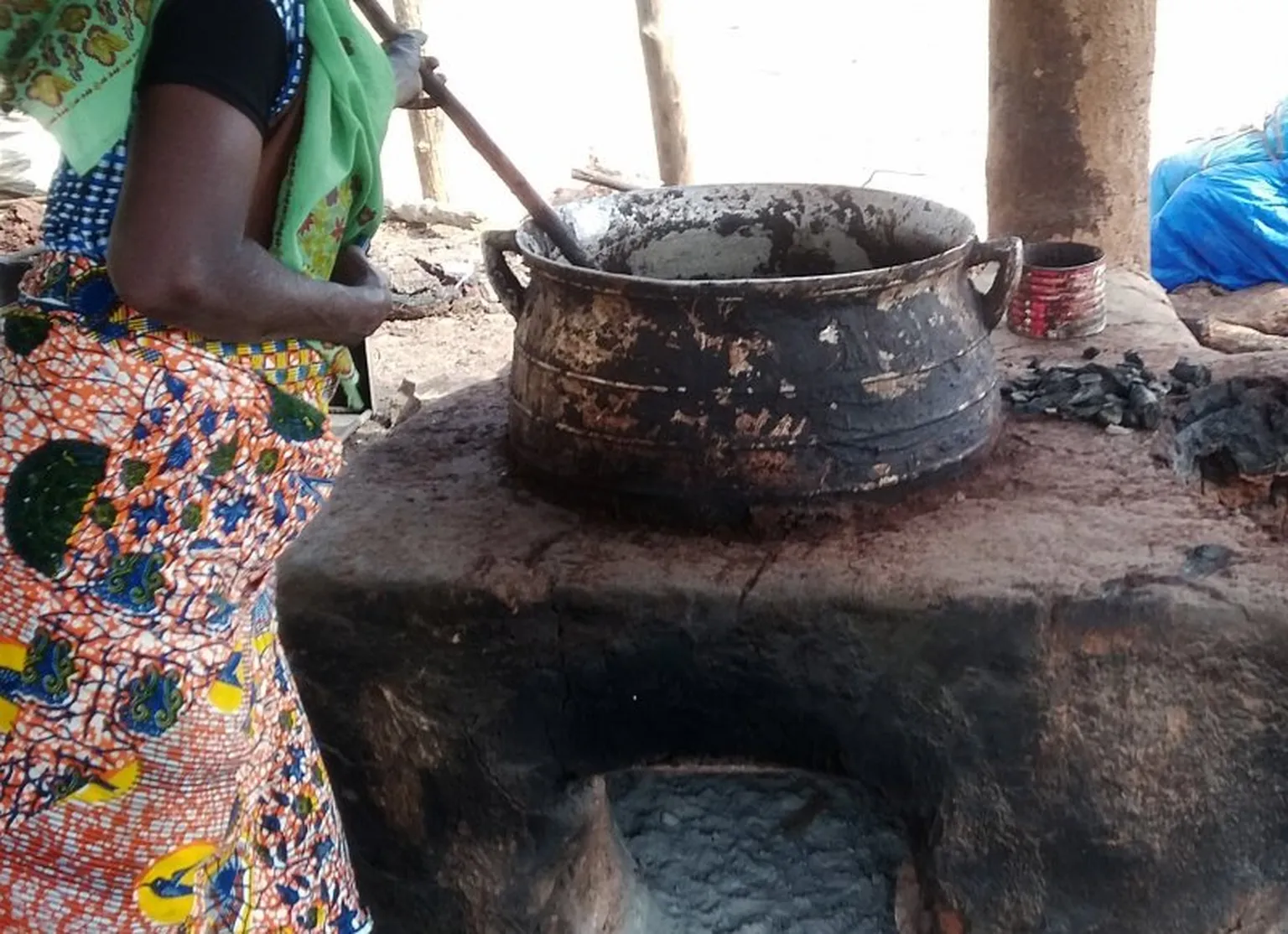 The efficient cookstoves on which the cracked nuts are cooked