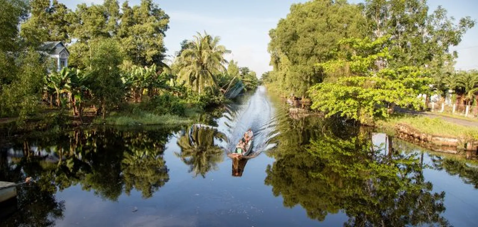 Boat through river