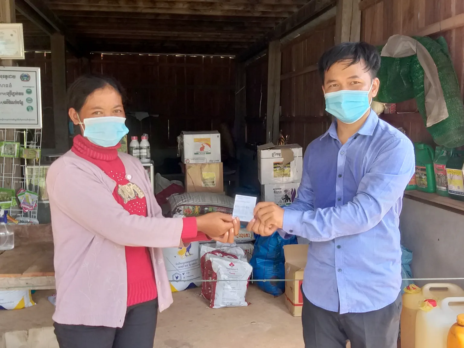 COVID-19 impacted farmer receives cash coupon