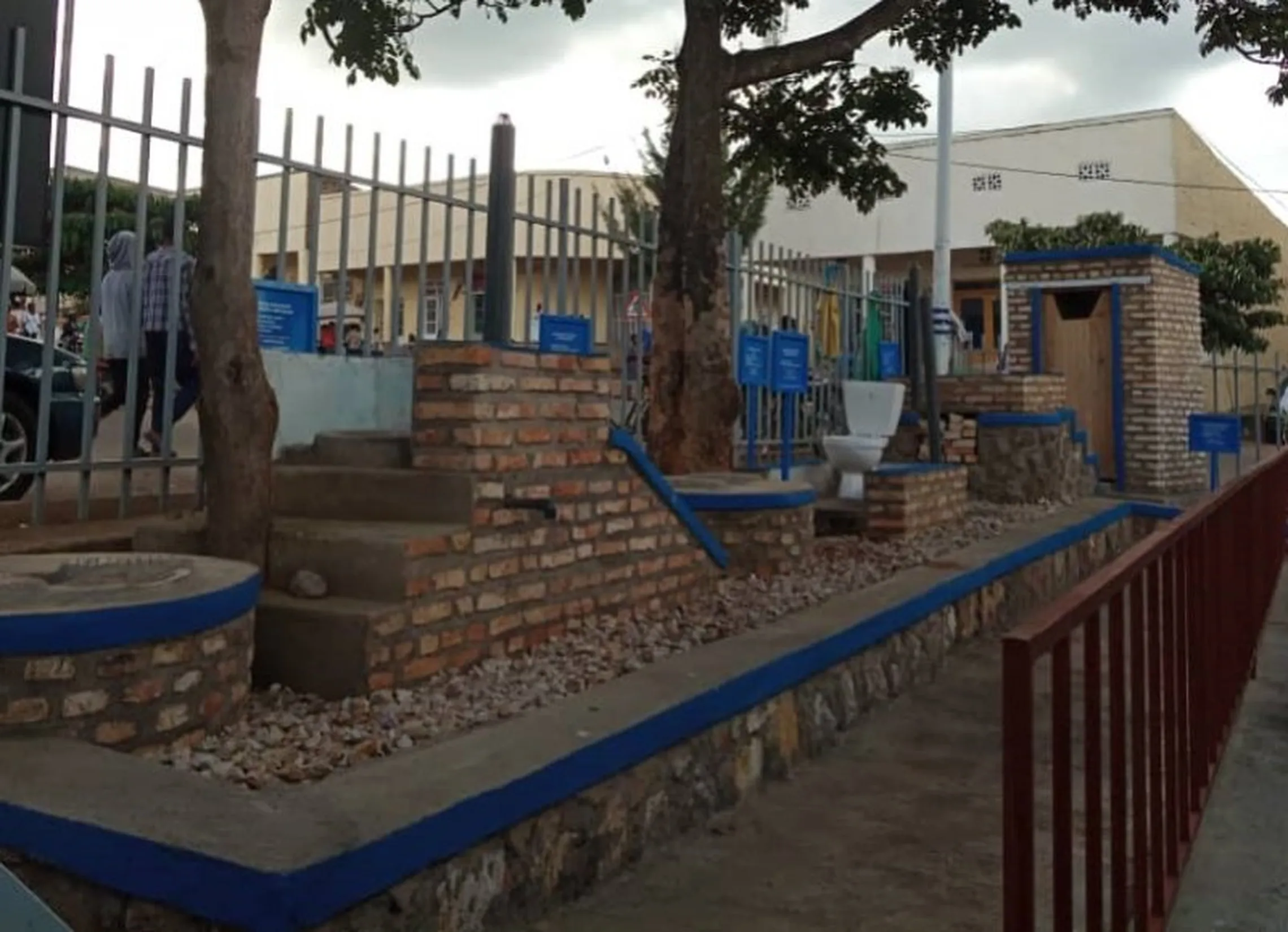 Various latrine prototypes on display outside of Nyanza DSC