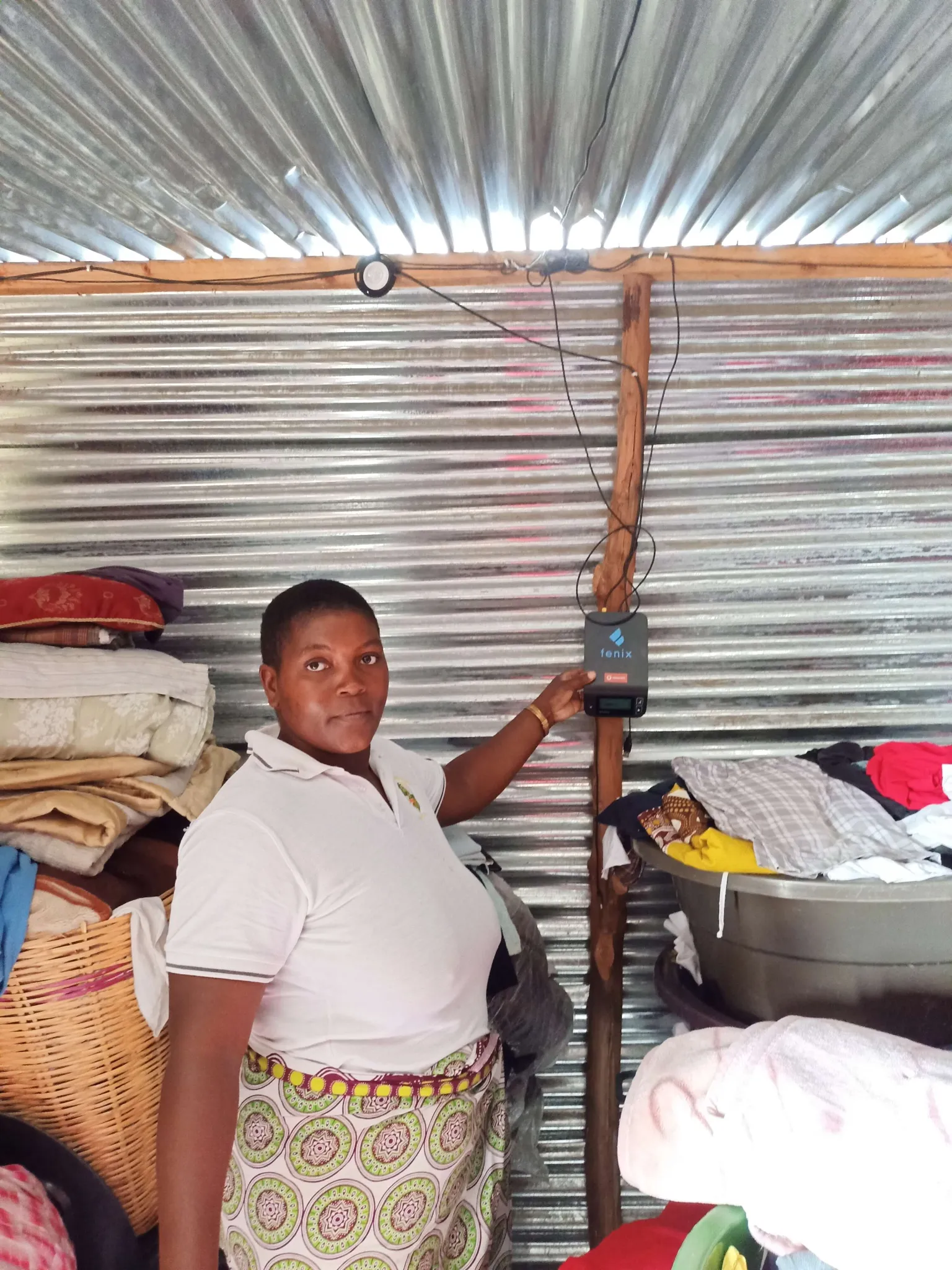 Image of a woman switching on a light