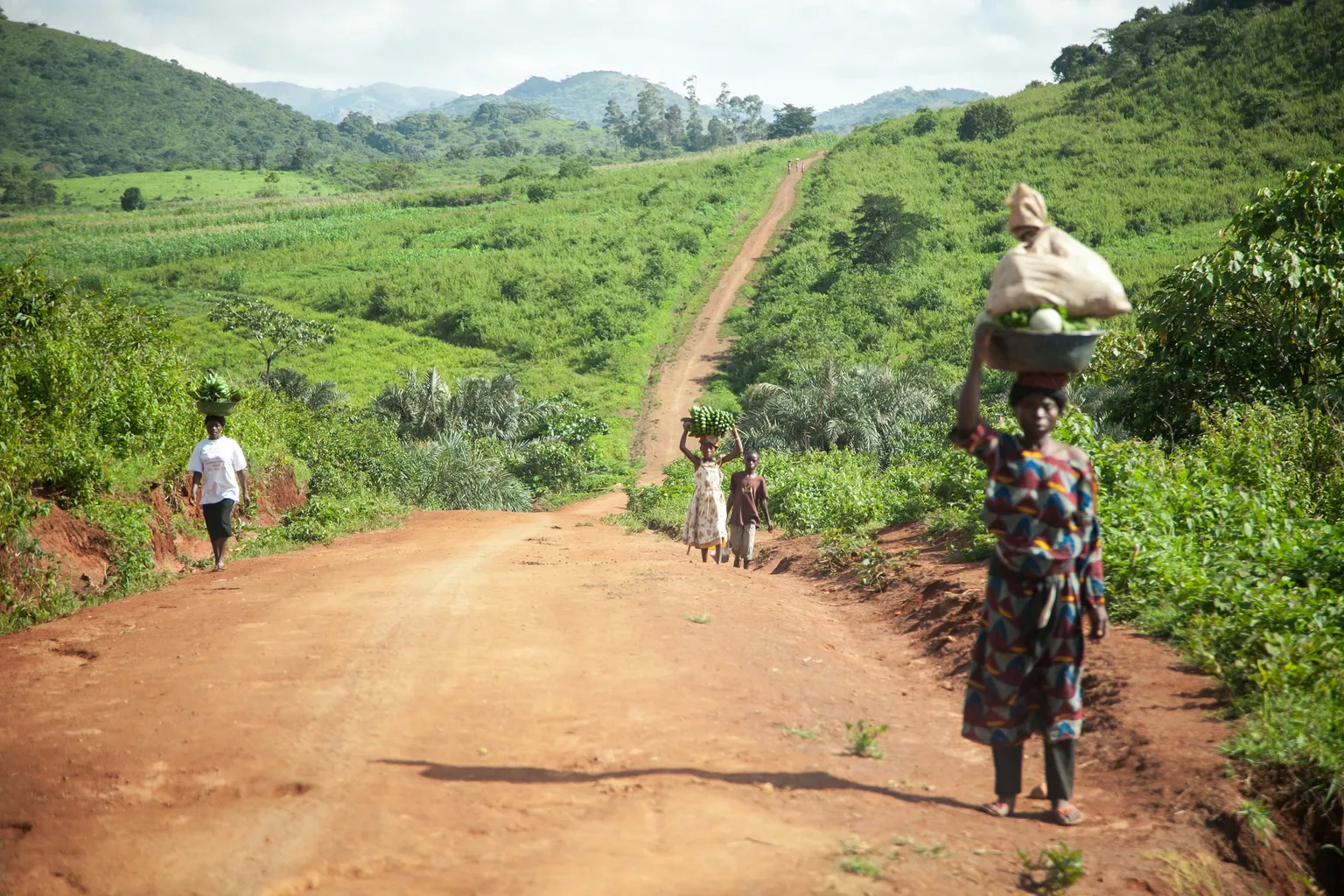 A road in Cameroon where people are walking