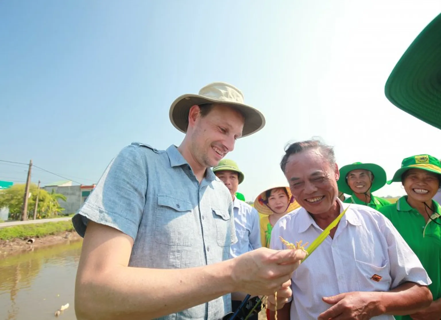 Group of people meeting a field