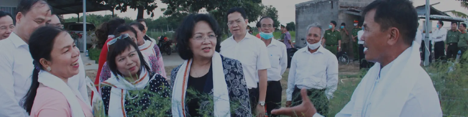 Vice president talking to people in a village.