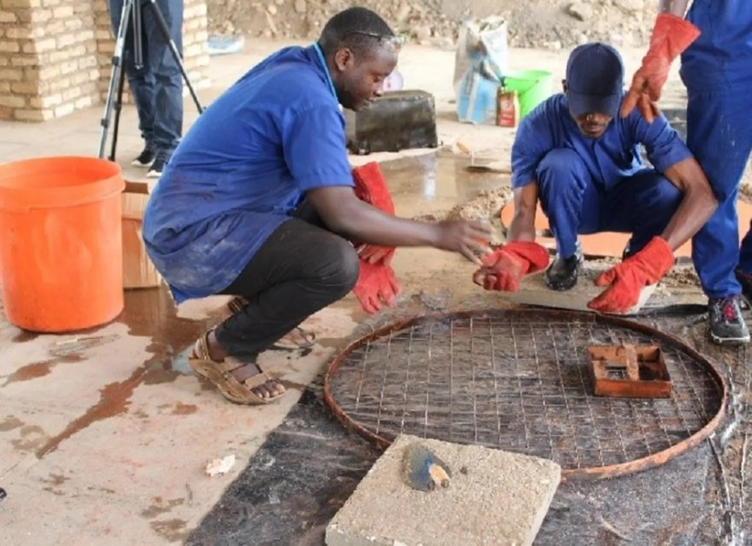 Emmanuel working with other participants during SAFI workshop in Nyanza