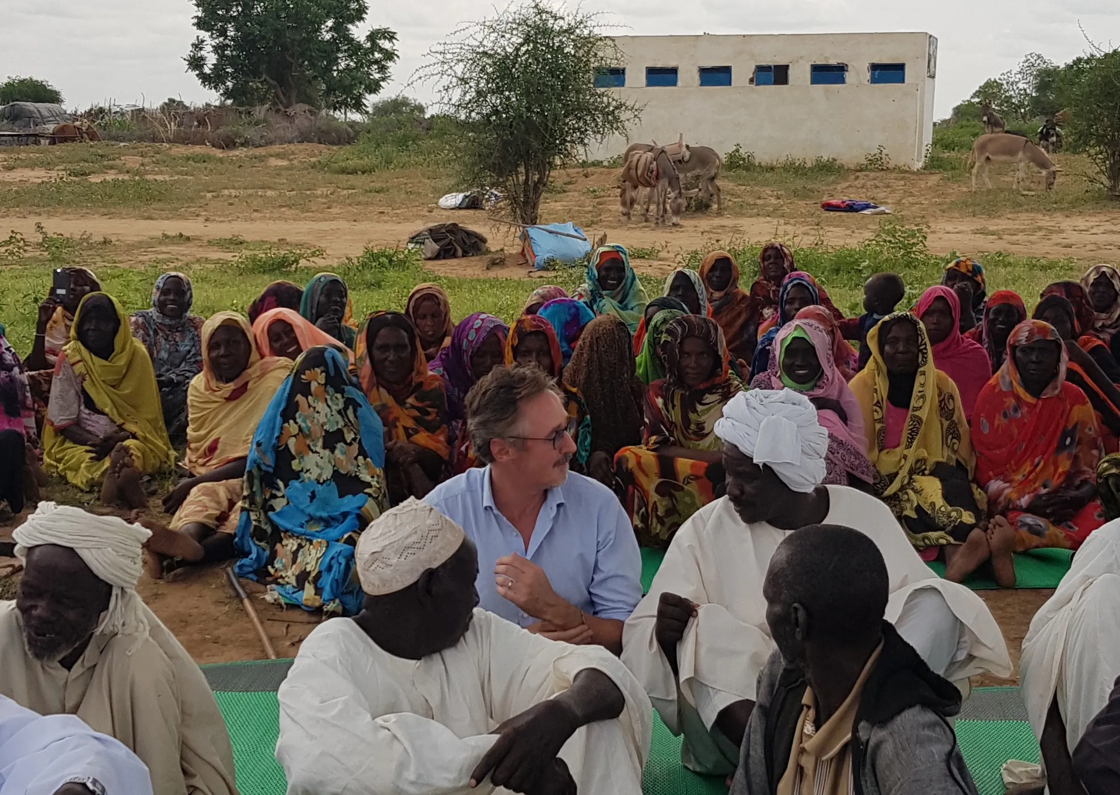 Simon amidst community peace-building discussions in West Darfur