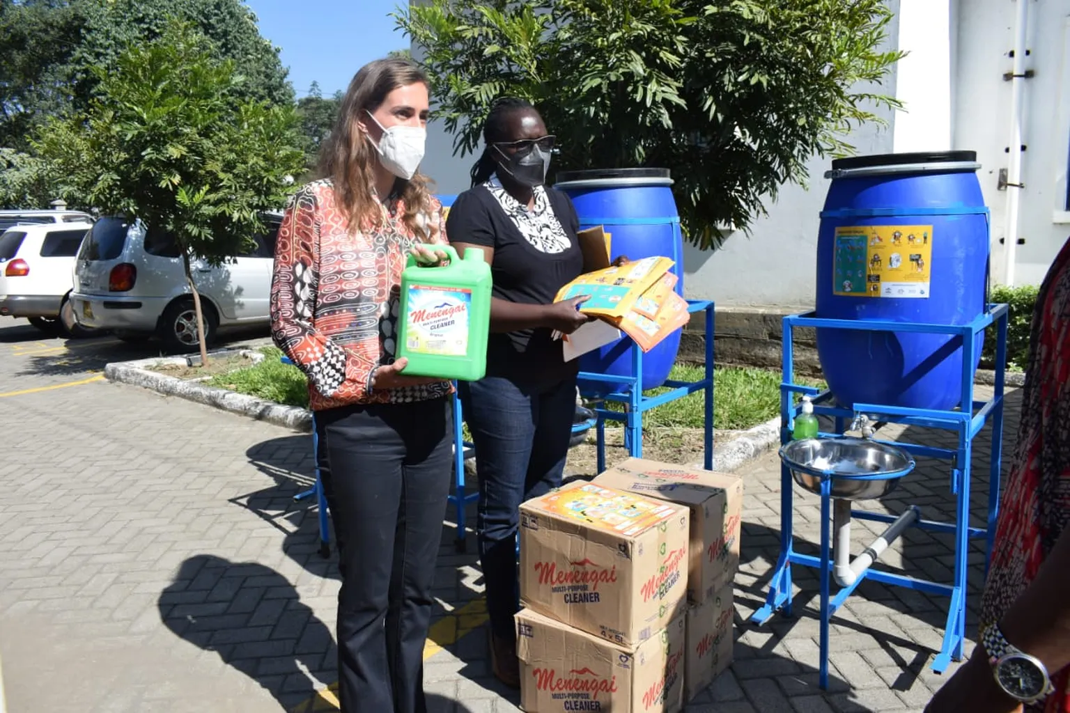 SNV staff delivering handwashing facilities and soap to a school in Nakuru