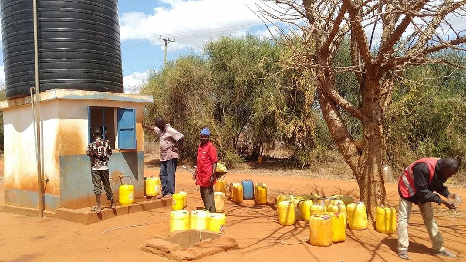 Water collection in rural Kenya with storage tank connection