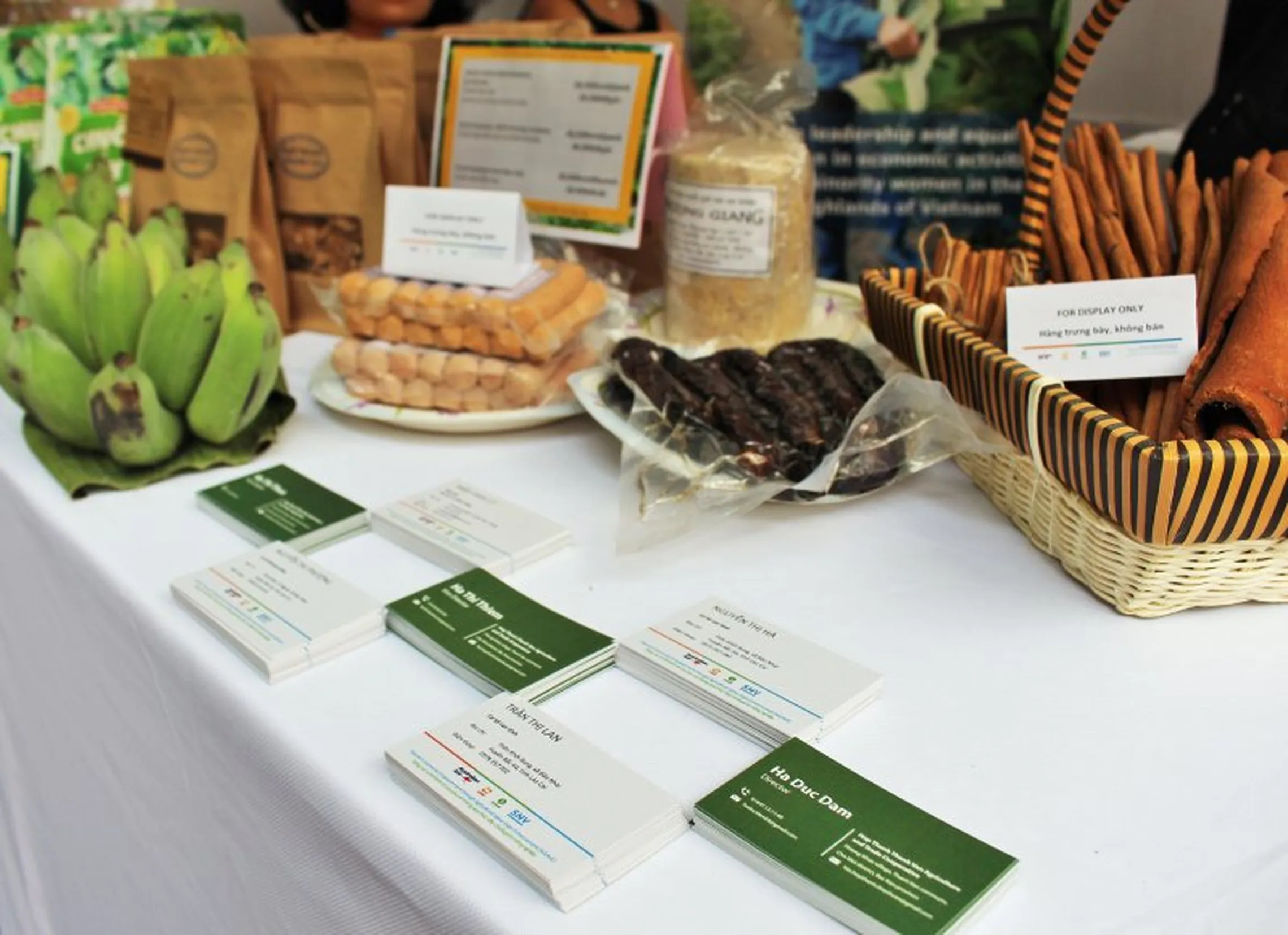 Banana, pork and cinnamon products and business cards of local producers